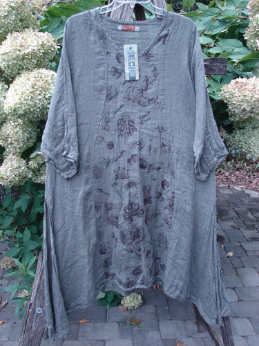 Barclay NWT Linen High Vent Venetian Dress Farm Dark Caper Size 1, featuring a loose-cut with botanical print, rolled sleeves, oval neckline, and a varying hemline, displayed on a hanger.