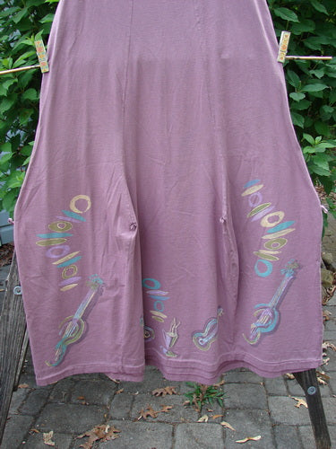 Barclay Constellation Jumper Music Festival Dusty Plum Size 1 features a deeply scooped neckline, pointed hem accents, and music festival-themed guitar patterns, embodying BlueFishFinder's creative, vintage-inspired style.