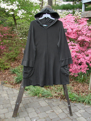 Vintage Barclay Thermal Cotton Lycra Hooded Circle Dress in Off Black, Size 2. A cozy, A-line dress with a floppy hood, circular pockets, and unique hemline. Perfect for creative expression.