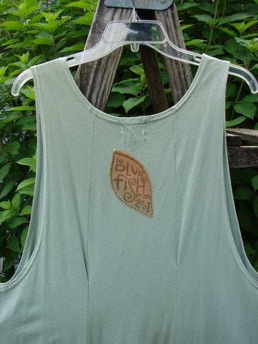 Barclay Constellation Jumper Garden Folly Aloe Size 1 features a scooped neckline, pointed hem accents, and distinctive vertical panels, embodying Bluefishfinder's vintage style with organic cotton craftsmanship.