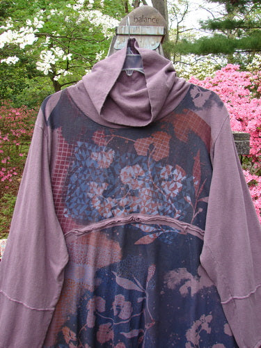 Barclay Cotton Hemp Mock Bell Dress Grid Garden Dusty Plum Size 2: A purple hoodie with a floral design, featuring a mock flop collar, varying hemline, and raw seams. Vintage Blue Fish Clothing from BlueFishFinder.com.