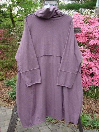 Barclay Cotton Hemp Mock Bell Dress Grid Garden Dusty Plum Size 2, featuring a unique design with a mock flop collar, varying hemline, raw seams, and grid garden theme. Front paint detail, deep pockets, and bell shape with empire waist.