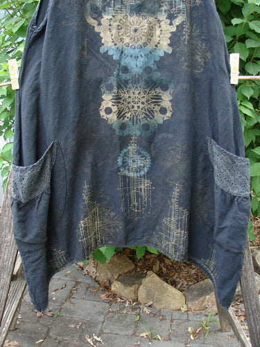 Barclay Linen Lace Two Pocket Pinafore Metallic Travel Black Size 0 features a unique blue and white design, visible in the close-up, showcasing its intricate lace detailing and distinctive neckline.