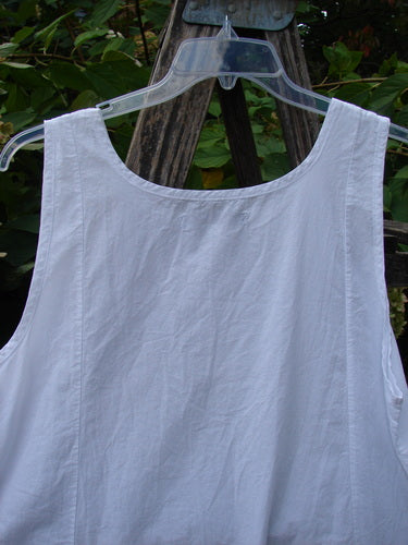 Barclay NWT Retro Pinch Shift Unpainted White Buttercup Size 1, featuring a sleeveless, lightweight smock-style top with a rounded neckline and wide A-line hem, displayed on a clear hanger.