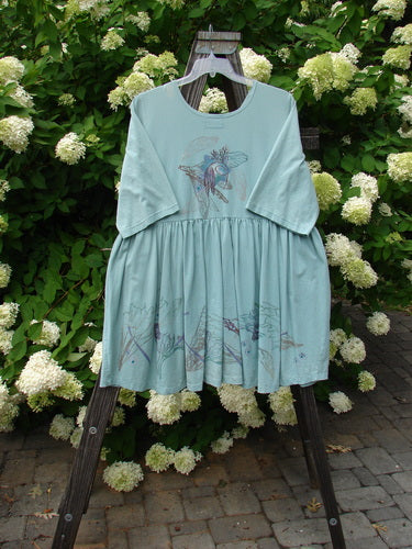 Barclay Flower Garden Tunic Dress: A medium-weight organic cotton dress with a ceramic button front, pleated skirt, and dragonfly theme paint. Size 2.
