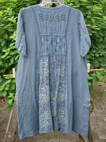 Barclay Linen Double Tie Back Jacket Star Rain Blue Mineral Size 0 features a deep V neckline, generous short sleeves, vertical stitchery, drop flop pockets, and a unique hemline, embodying Bluefishfinder.com's vintage aesthetic.