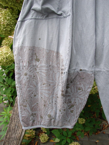 Barclay Crop Two Pocket 4 Square Pant Spin Flower Grey Green Size 0 draped over railing, featuring wide lower legs with subtle print and paint splatters, reflecting Bluefishfinder.com's vintage, artistic style.