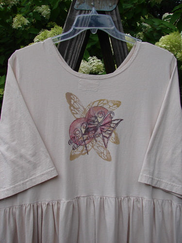 Barclay Flower Garden Cardigan Dress with dragonfly design on a white shirt.