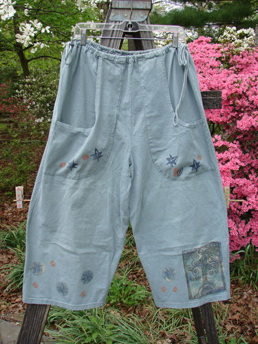 Vintage 1993 Garden Pant featuring a leaf and tree motif in Ocean, size 2. Medium weight cotton, corded ties, wide crop shape, deep pockets. From BlueFishFinder's collection of unique, expressive clothing.