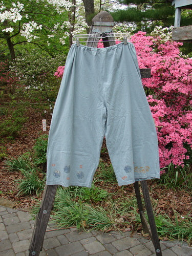 Vintage 1993 Garden Pant featuring a star, leaf, and tree design in Ocean, size 2. Medium weight cotton, corded side ties, wide crop shape, deep pockets. From BlueFishFinder's collection of unique, expressive clothing.
