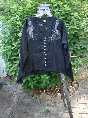 Close-up of the Barclay Linen Tiny Button Dip Side Cardigan Fern Shadow Black Size 0, featuring a deep V neckline, shell buttons, and three-quarter sleeves from Bluefishfinder.com's vintage-inspired collection.