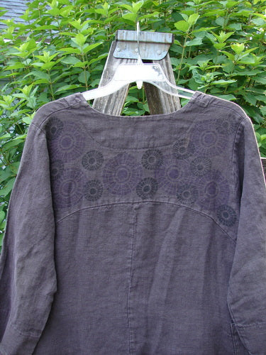 Barclay Hemp Cotton Summercloth Dip Side Pocket Jacket Pinwheel Brum Size 1 displayed on a swinger, showcasing a deep V neckline, dipped sides, three-quarter sleeves, dual angular pockets, and a dramatic hemline.