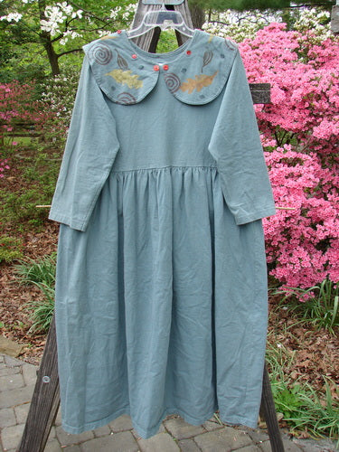 Vintage 1992 Silly Collar Dress in Grey Green, Size 1, from BlueFishFinder. Medium weight cotton, sailor collar with vintage buttons, empire waist, gathered fabric, A-line shape. Bust 42, Waist 44, Hips 70, Length 48.