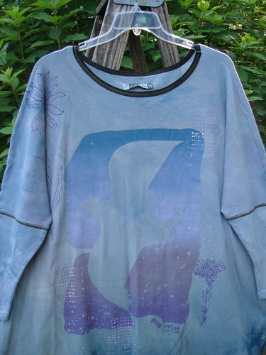 Barclay NWT Thermal Contrast Revival Top Love Dove Blue Skies OSFA features ribbed sleeves, a rounded neckline, and a love dove theme, showcasing BlueFishFinder's dedication to creative, expressive vintage clothing.