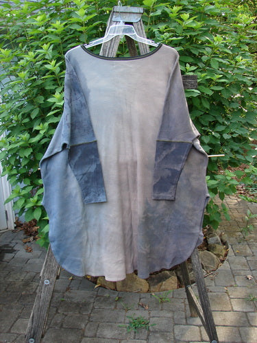 Barclay NWT Thermal Contrast Revival Top Tunic Tree Line Amethyst Smoke OSFA displayed on a clothes rack, showcasing its ribbed sleeves, rounded neckline, and distinctive tree line theme design.