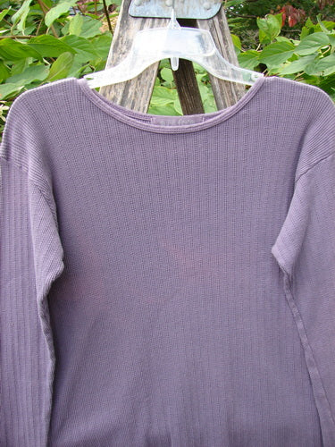 1998 Pointelle Long Sleeved Under Top Unpainted Modena Size 1 displayed on a hanger, showcasing its waffle-knit texture and long sleeves, ideal for layering with Blue Fish Clothing.