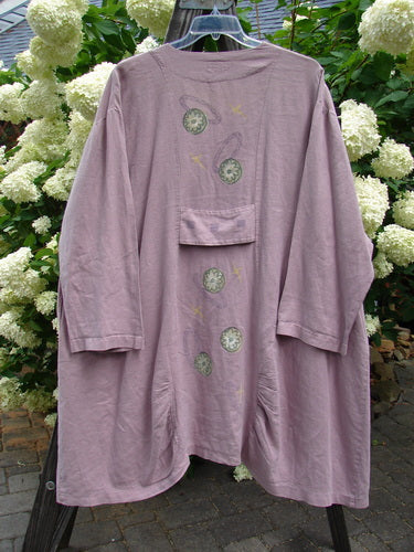 1999 Parlor Jacket with Circle Florals, Heliotrope, Size 2: A linen jacket with V-shaped neckline, abalone buttons, gathered front and back, side pockets, and a painted rear tab.
