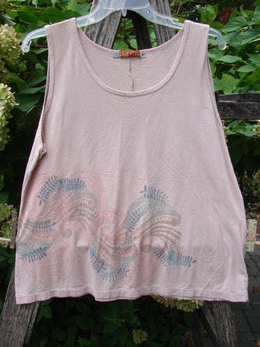 Barclay Batiste Tank Top Fern Wind Blush Size 1, featuring a wave-like botanical print, hangs outdoors on a clear hanger. Its lightweight fabric and unique neckline embody Bluefishfinder.com's vintage, expressive style.