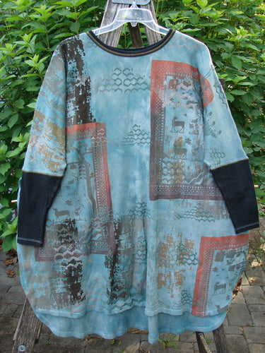 Barclay Thermal Contrast Revival Top Farm Turq OSFA displayed on a rack, showcasing its contrasting ribbed sleeves, rounded neckline, and unique farm-themed design, exemplifying Bluefishfinder.com's vintage, expressive style.