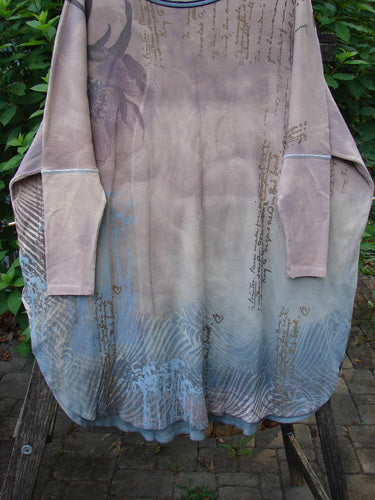 Barclay Thermal Contrast Revival Top Script Pastels OSFA displayed on a hanger, featuring ribbed sleeves, a rounded neckline, and script theme paint, embodying Bluefishfinder.com's vintage, creative fashion ethos.