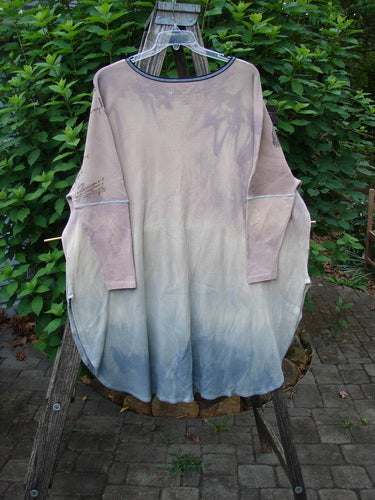Barclay Thermal Contrast Revival Top Script Pastels OSFA displayed on a clothesline, showcasing its ribbed sleeves, rounded neckline, A-line shape, and continuous script theme design.