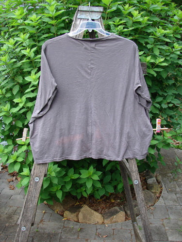 Barclay Cotton Slub Cricket Cap Sleeve Tee Primitive Pony Dark Stone OSFA on a rack, highlighting seamless shoulder sleeves, boxy shape, and primitive pony theme, embodying Bluefishfinder.com's vintage and creative clothing ethos.