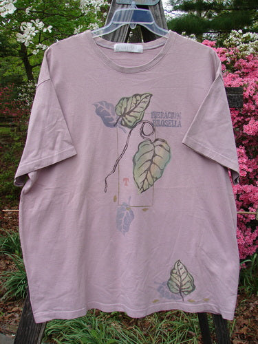 Vintage 1998 Botanicals Short Sleeved Tee featuring Turn Leaf design from Passiflora Collection. Organic Cotton, Boxy Shape, Blue Fish Patch. Bust 54, Waist 54, Hips 54, Length 32 inches.