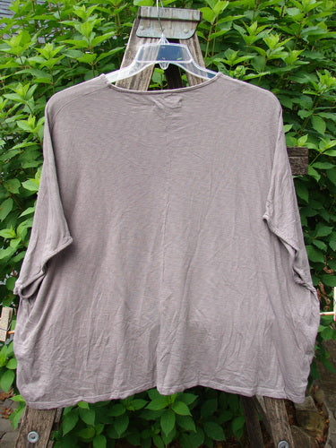Barclay Cotton Slub Cricket Cap Sleeve Tee Leaf Play Light Stone OSFA displayed on a hanger, showcasing its cap sleeves, slightly flared hip, rounded hemline, and seamless shoulder design.