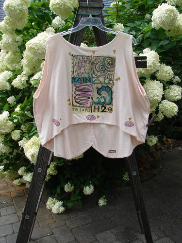 Image alt text: "1992 Folk Vest with unique upward scooped back line and vintage buttons, made from double-layered mid-weight cotton, featuring a detailed elements theme."
