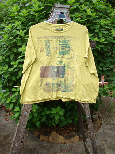 Barclay Cotton Slub Cricket Cap Sleeve Tee Home Citron OSFA displayed on a wooden ladder, highlighting its seamless cap sleeves and boxy shape, embodying Bluefishfinder.com's vintage, creative clothing ethos.