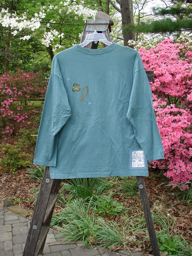 Vintage 1997 Long Sleeved Tee in Cypress with Diamond Theme Paint, Size 1. Features mid-weight organic cotton, wider ribbed neckline, drop shoulders, and cozy longer sleeves. Bust 50, Waist 50, Hips 50, Length 28.