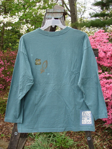 Vintage 1997 Long Sleeved Tee with Diamond Theme Paint on Mid Weight Organic Cotton. Features wider ribbed neckline, drop shoulders, and cozy longer sleeves. Perfect condition from Cypress. Bust 50, Waist 50, Hips 50. Length 28.