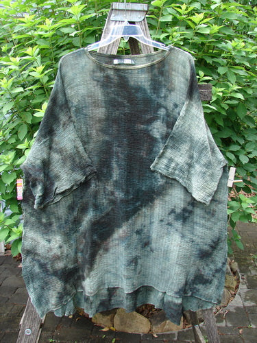Barclay Crinkle Gauze Ana Tunic Dress Unpainted Mottled Forest OSFA, showcasing a shallow rounded neckline, wide three-quarter sleeves with frays, seamless shoulder, and varying hemline in lightweight cotton gauze.