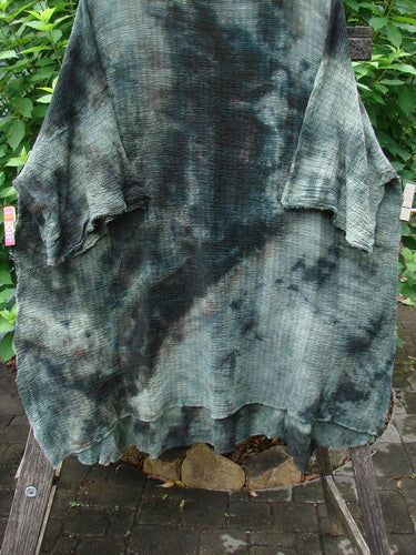 Barclay Crinkle Gauze Ana Tunic Dress Unpainted Mottled Forest OSFA displayed on a swinger, featuring wide three-quarter sleeves with frayed edges and a varying hemline, embodying Bluefishfinder.com's creative vintage style.
