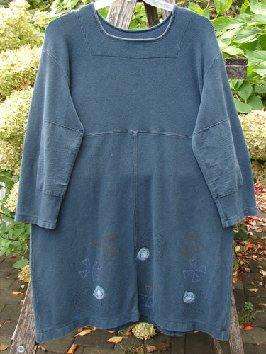 1999 Thermal Home Dress Paisley Peacock Size 0: Loose-fitting teal-blue tunic with three-quarter sleeves, squared neckline, and flared skirt. Features include elbow patches, decorative motifs near hem, and unique sectional panels.