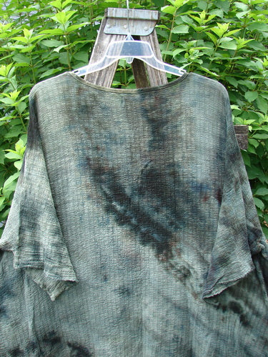 Barclay Crinkle Gauze Ana Tunic Dress Unpainted Mottled Forest OSFA displayed on a hanger, showcasing its wide three-quarter sleeves, seamless shoulder, and varying hemline, embodying Bluefishfinder.com's vintage-inspired aesthetic.