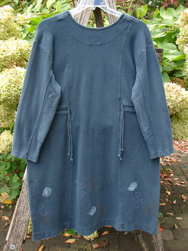 1999 Thermal Home Dress Paisley Peacock Size 0 with squared neckline and rectangle elbow patches features sectional panels and an empire waist, elegantly displayed against hydrangeas, embodying vintage Blue Fish creativity.