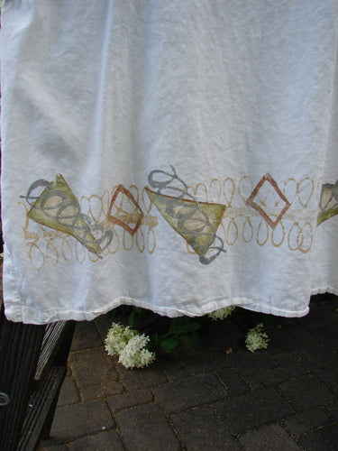 2000 Hemp Viscose Asymmetric Top Space White Size 1: A white towel with a design on it, a piece of food on a white surface, a close-up of a triangle, a close-up of a black object, a white towel with brown and grey designs, a white flowers on a brick surface, a close-up of a flower, a close-up of a flower, a close-up of a stone floor.