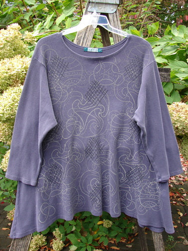 Barclay Thermal A Lined Top Spirograph Plum Size 2 displayed on a hanger, showcasing its loose fit, subtle swirl and lattice stitch pattern, three-quarter sleeves, and rounded neckline.