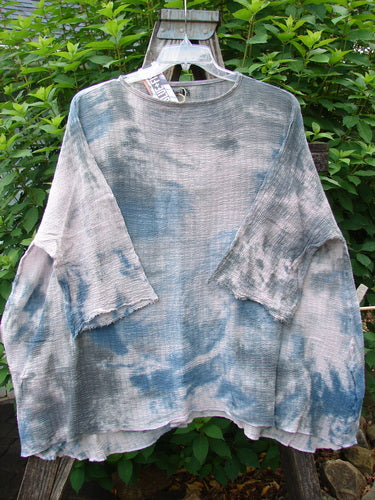 Barclay NWT Crinkle Gauze Top in Mottled Pink Gray Celestial displayed on a swinger, featuring a high-low hemline, three-quarter dolman sleeves, and a square boxy shape, embodying Bluefishfinder.com's vintage style.
