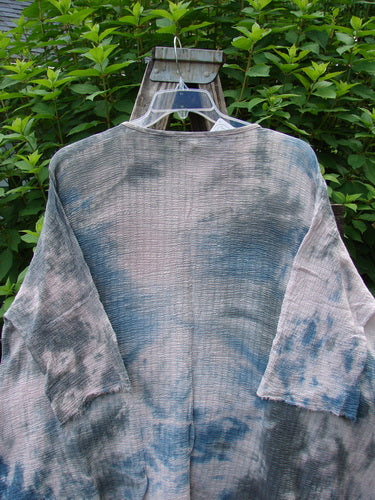 Barclay NWT Crinkle Gauze Top Mottled Pink Gray Celestial OSFA displayed on a swinger, highlighting its three-quarter dolman sleeves, high-low hemline, and boxy silhouette, reflecting Bluefishfinder.com's vintage aesthetic.