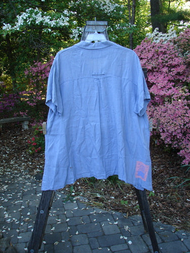 Vintage 1999 Thyme Top in Iris, Size 2, by Blue Fish. A breezy handkerchief linen top with A-line shape, pleated back swing, vented sides, and oversized buttons. Perfect for creative expression.