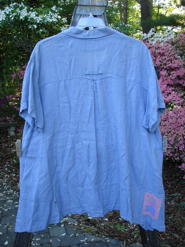 Vintage 1999 Thyme Top in Iris, Size 2, by BlueFishFinder. A swing-style blue shirt in handkerchief linen, featuring an A-line shape, tabbed back, vented sides, and oversized buttons. Feminine, breezy, and timeless.
