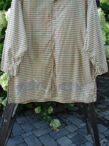 1996 Tourist Top Fish Border White Pine Size 2: A shirt on a rack with a fish border theme paint. Full button front, cuffs, and buttons. Vented sides, stand-up collar. Perfect condition, light-weight cotton percale. Bust 56, waist 58, hips 60, length 34.