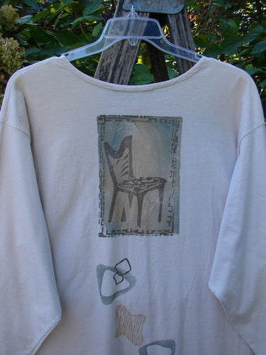 1995 Stargazer Jacket Chair Row China OSFA: Light long-sleeve top with a chair silhouette and abstract shapes, hanging outdoors. Features include a painted breast pocket, paper buttons, and drop shoulders, embodying vintage Blue Fish style.