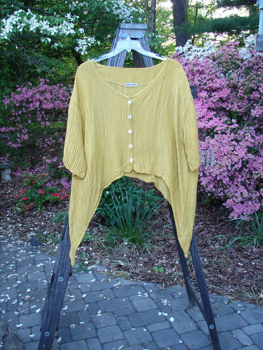 Vintage Barclay Silk Rib Dip Side Button Jacket in Golden, Size 1, from BlueFishFinder.com. Features deep neckline, varying hemline, pearly buttons, and ribbed texture. Relaxed fit: Bust 60, Waist 62, Hips 64.