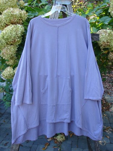 Barclay Art Studio Roo Sweatshirt Rear Rain Garden Lavender OSFA features a loose fit, wide neckline, long sleeves, kangaroo pocket, and exposed-stitch details, embodying a relaxed, bohemian style.