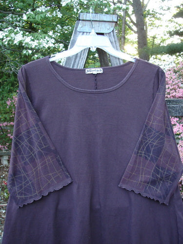 Barclay Three Quarter Grid Sleeved A Line Top Plum Size 1, a vintage Blue Fish creation by Jennifer Barclay. Features a linear grid pattern on fluttery edged sleeves, a rounded neckline, and a generous A-line shape.
