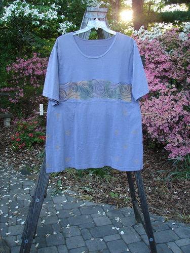 1993 3 Square Dress Wind Band Periwinkle OSFA displayed on a rack, highlighting its rounded neckline and sectional panels.