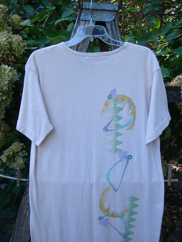 1996 Long Tea Dress Half Moon Birch Bark Size 0 displayed outdoors, featuring a pastel abstract design on the back with geometric shapes, rounded paneled neckline, and short wide sleeves, highlighting vintage Blue Fish style.